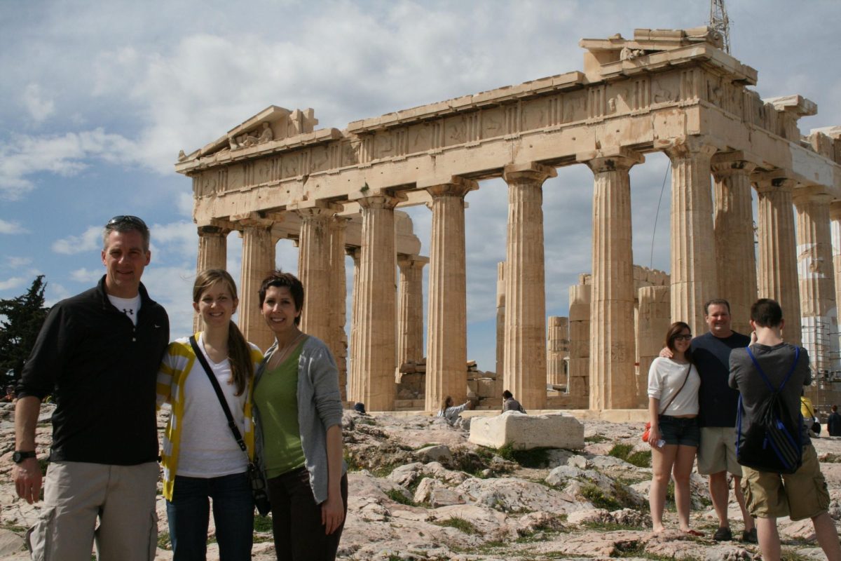 Mrs. Schlueter (Center in the group on the left) in front of the Parthenon in Greece.