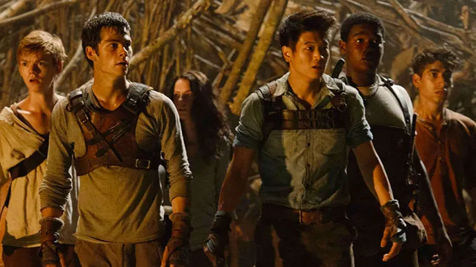The Gladers watching the maze open at the wrong time before they get attacked by the grievers.